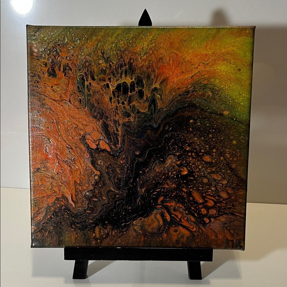 Abstract Canvas Art with Orange and Black Swirls